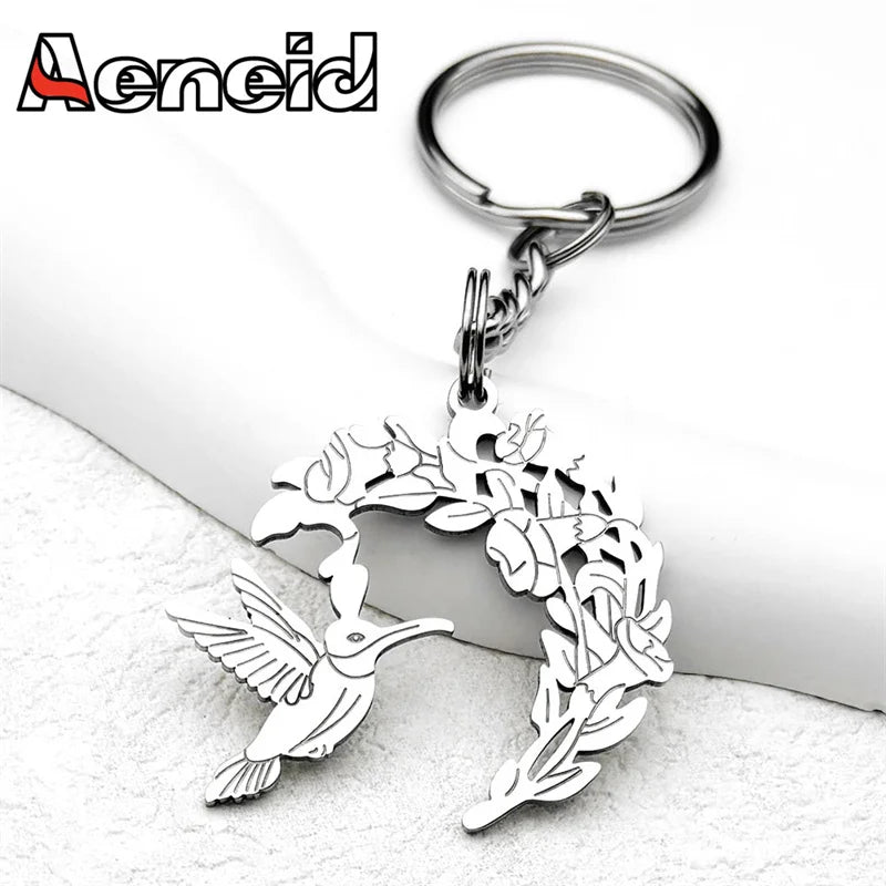 Silberfarbener Edelstahl Schlüsselanhänger Kolibri Blumen Motiv Unisex