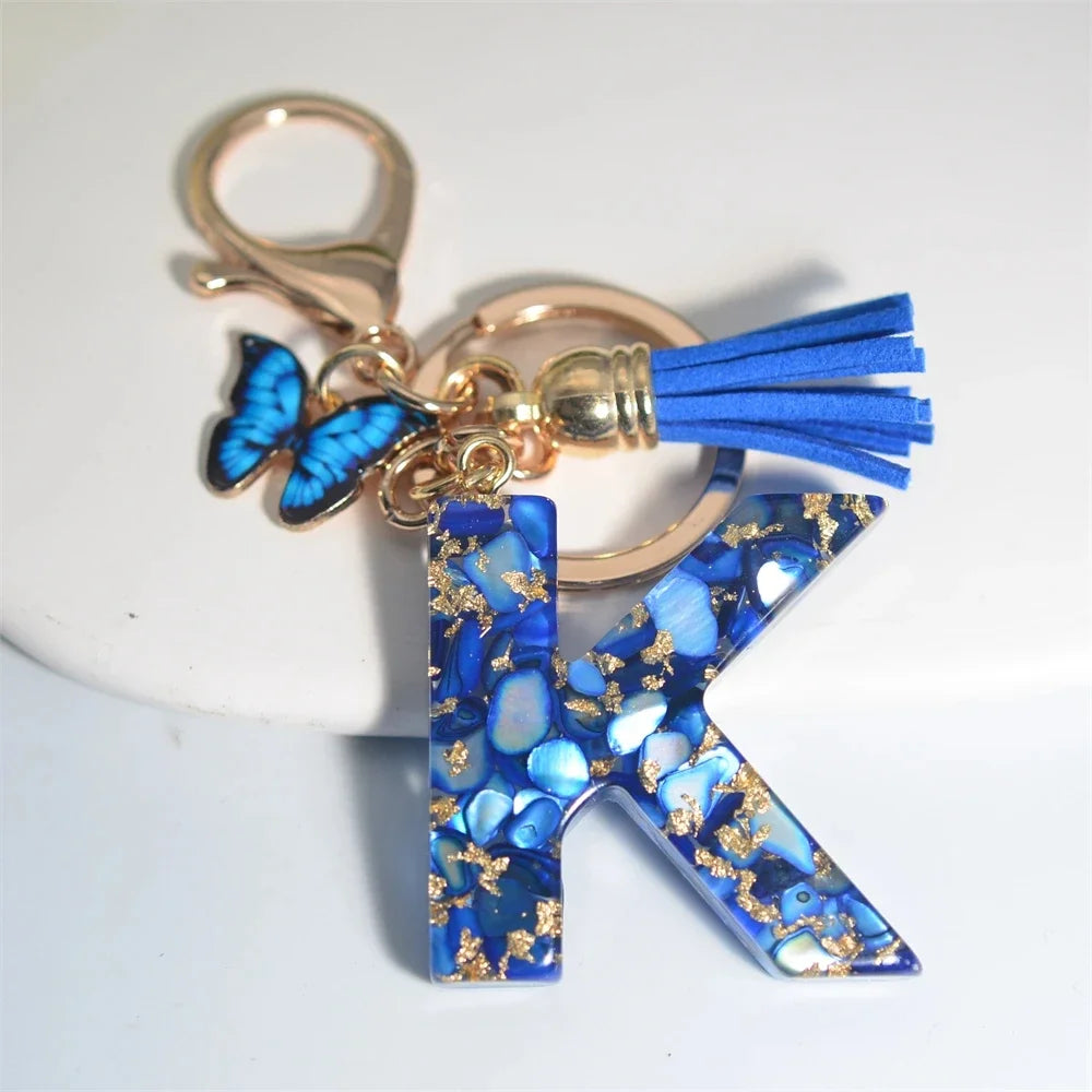 Blauer Buchstaben Schlüsselanhänger mit Quaste und Schmetterling 26 Initialen
