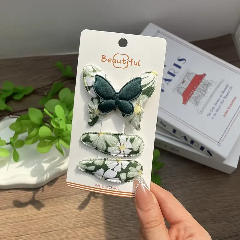 4-teiliges Haarschmuck Set für Mädchen mit Schmetterlingsdesign aus Polyester