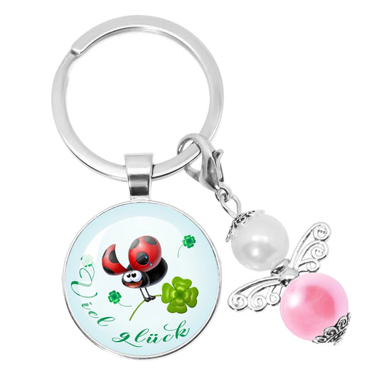 Glücksbringer Schlüsselanhänger mit vierblättrigem Kleeblatt Design