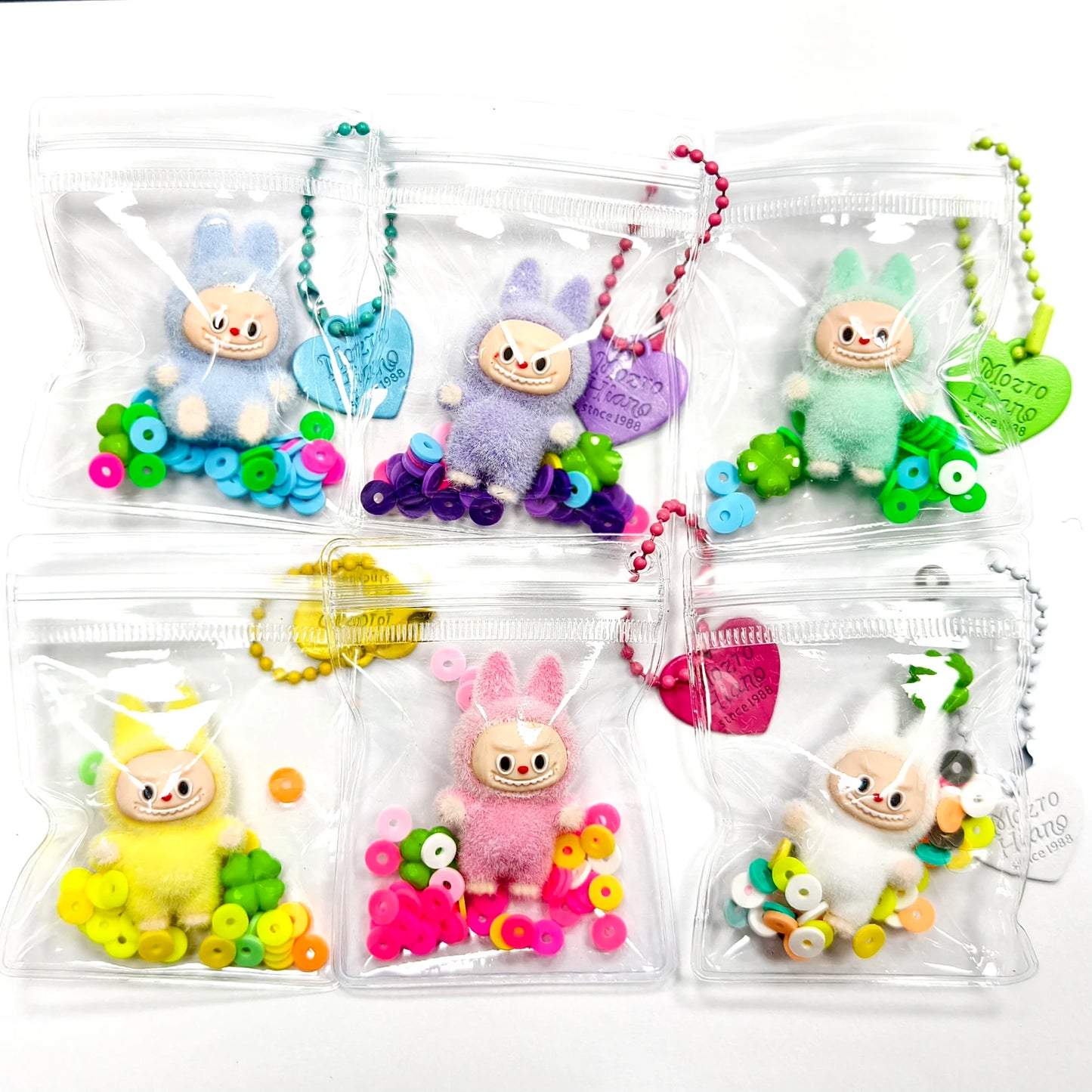 Kreativer transparenter Silikon Schlüsselanhänger mit Plüschmotiv