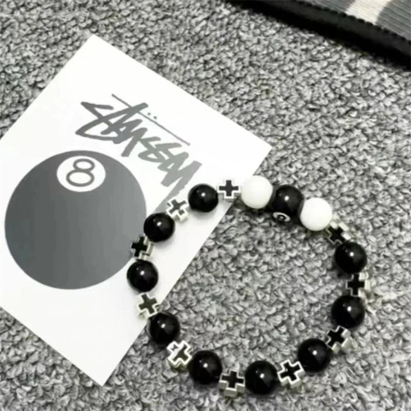 Elastisches Unisex Armband mit schwarzen Perlen Kugeln und Einstellbar