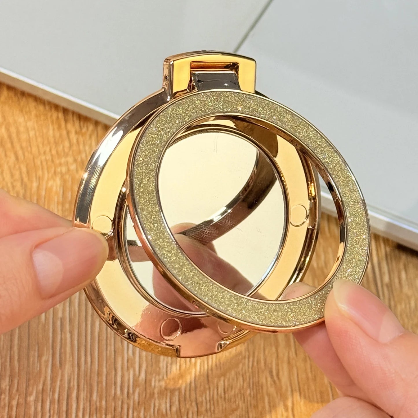 Glitzer-Handyhalter mit Ringgriff und runder Spiegel fürs Smartphone