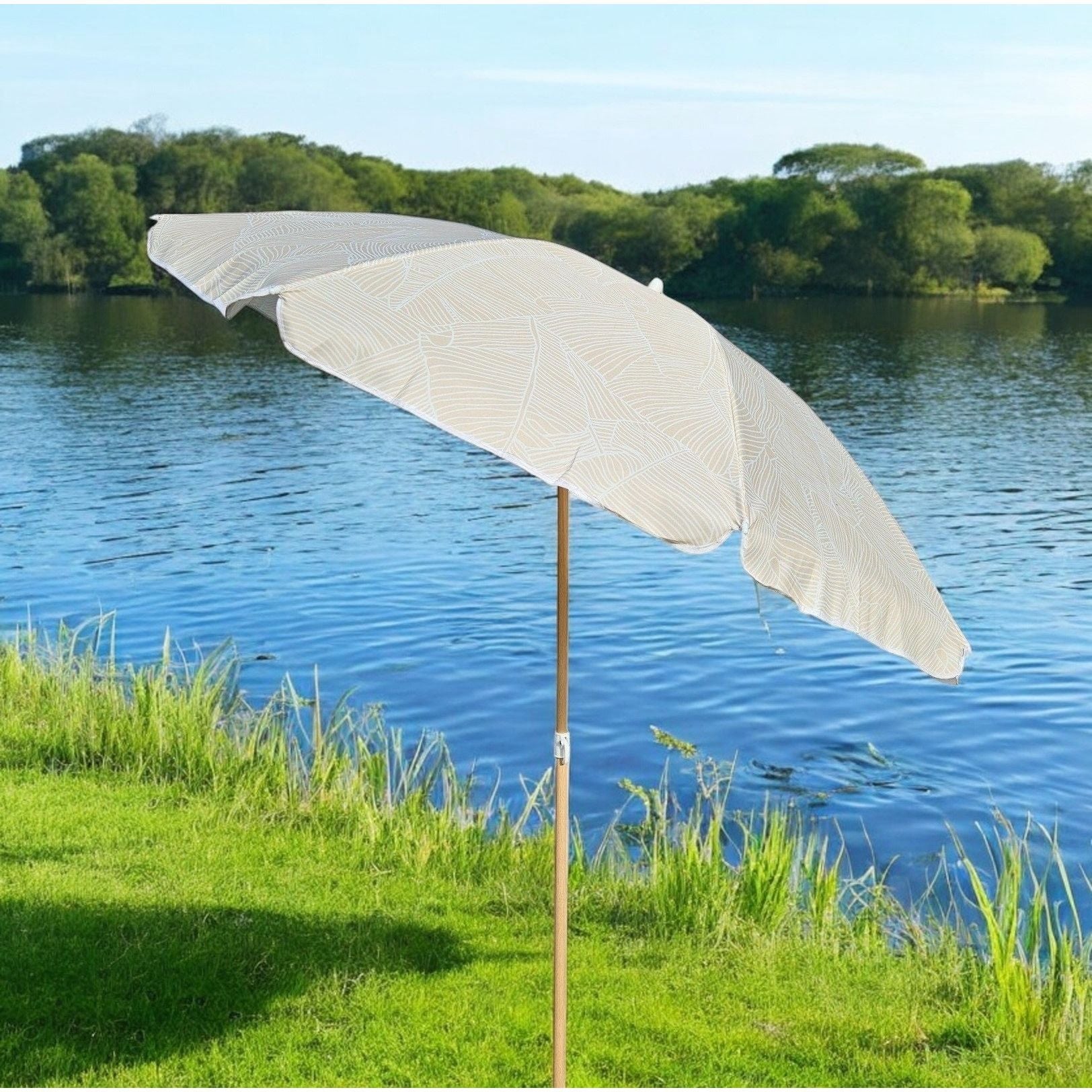 Flexibler Sonnenschirm mit UV Schutz 30 und Blätter Muster