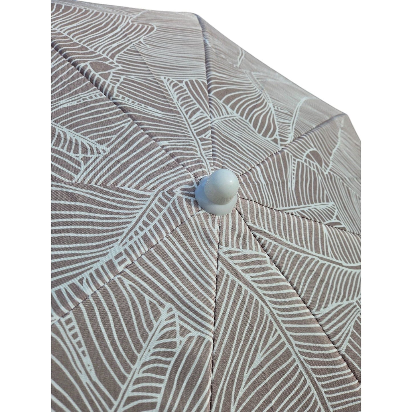 Flexibler Sonnenschirm mit UV Schutz 30 und Blätter Muster