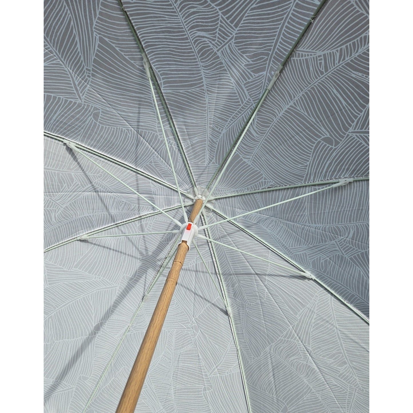 Flexibler Sonnenschirm mit UV Schutz 30 und Blätter Muster