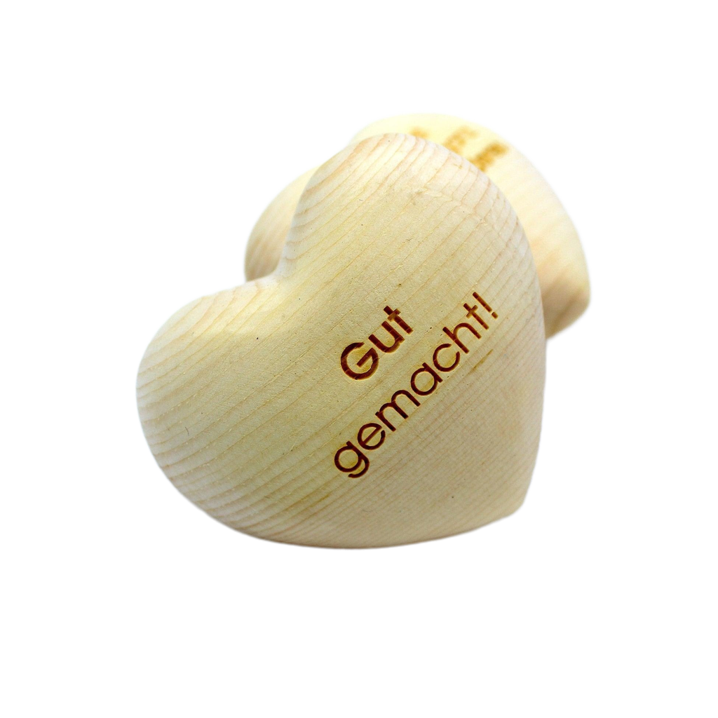 Handschmeichler aus Zirbenholz in Herzform für persönliche Botschaften