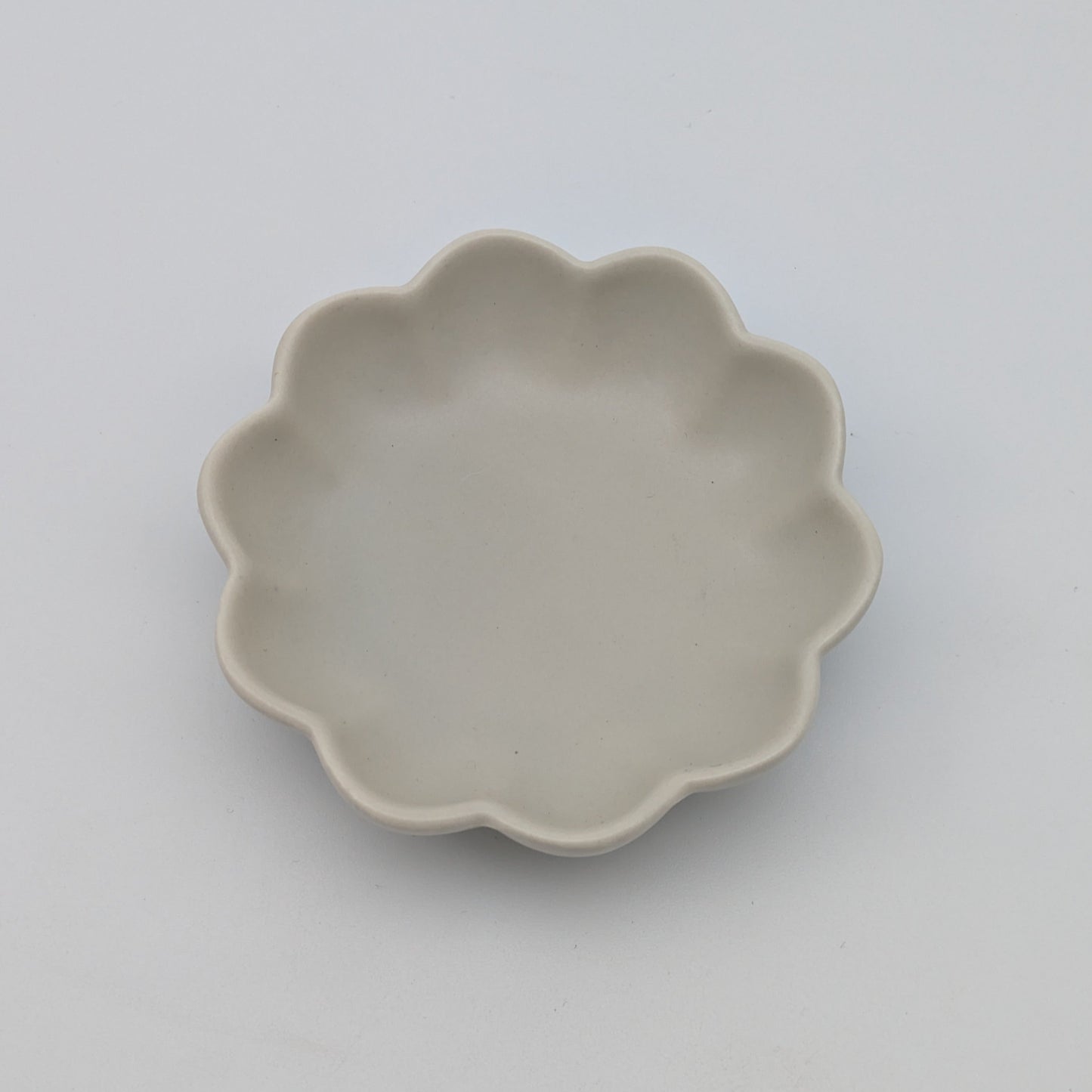 Untersetzer Blüte beige Hochwertiges Teegeschirr für stilvolles Ambiente